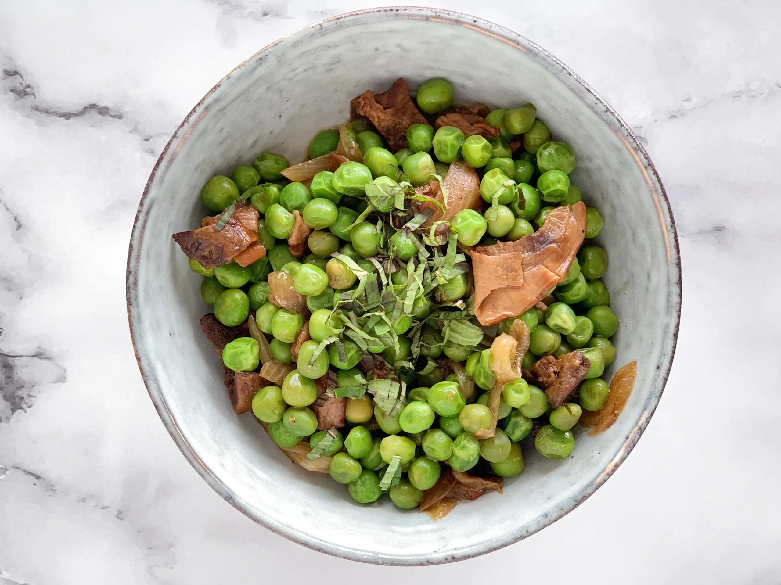 Guisantes rehogados con funghi porcini y menta