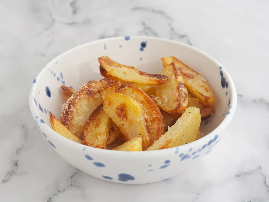 Patatas gajo al parmesano