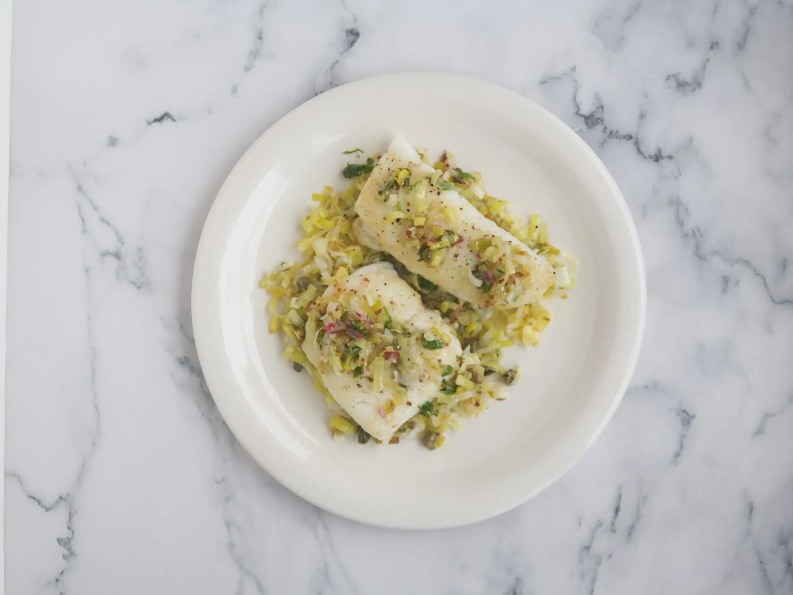 Pescado blanco con vinagreta de puerros