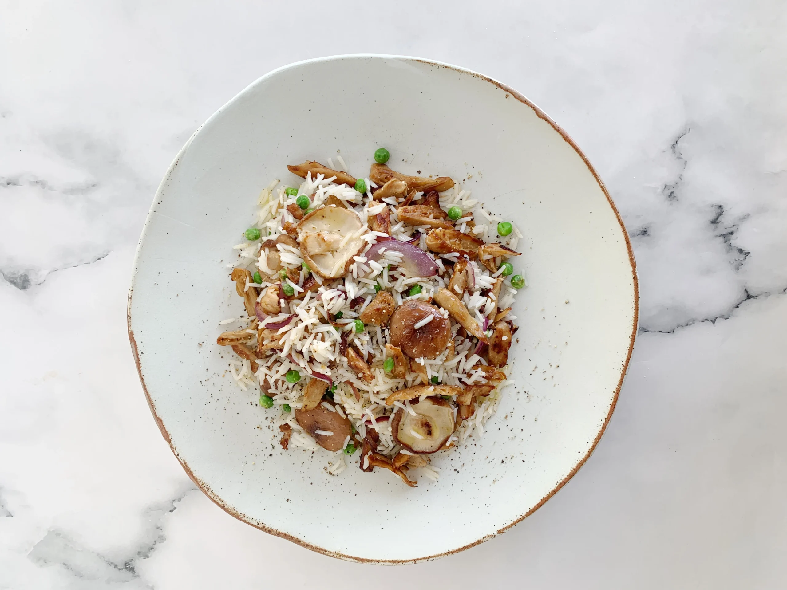 Salteado de Heura® con shiitakes y arroz